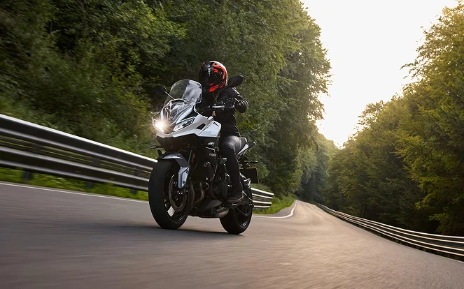 person driving a motorcycle